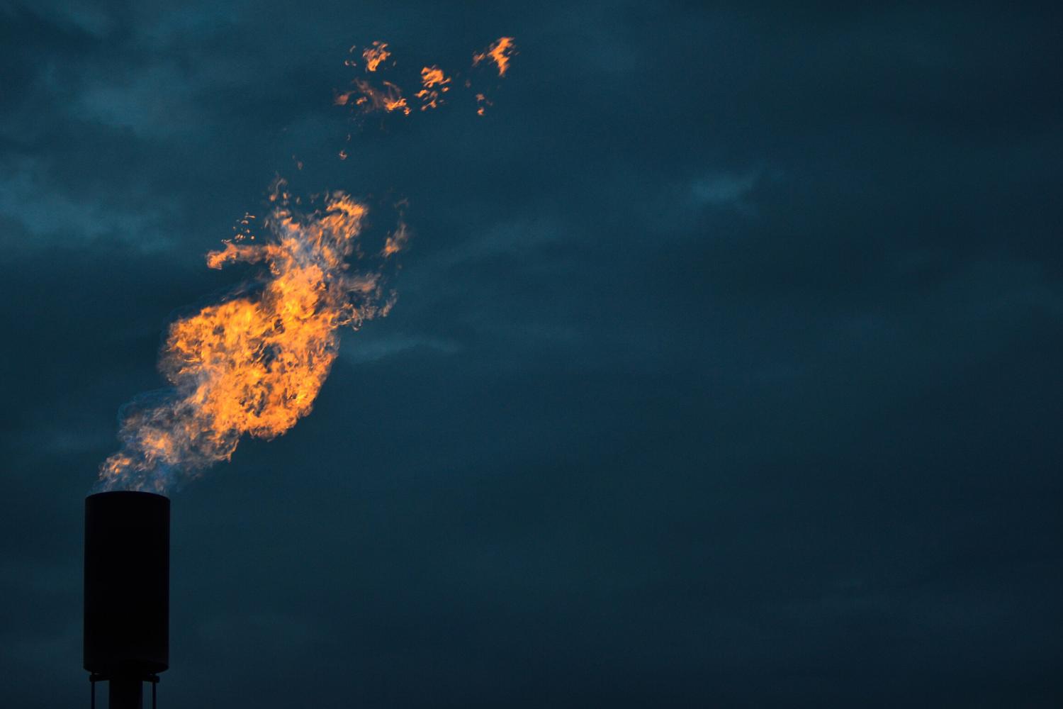 Methane burns from a flaring unit at a solid waste landfill. 