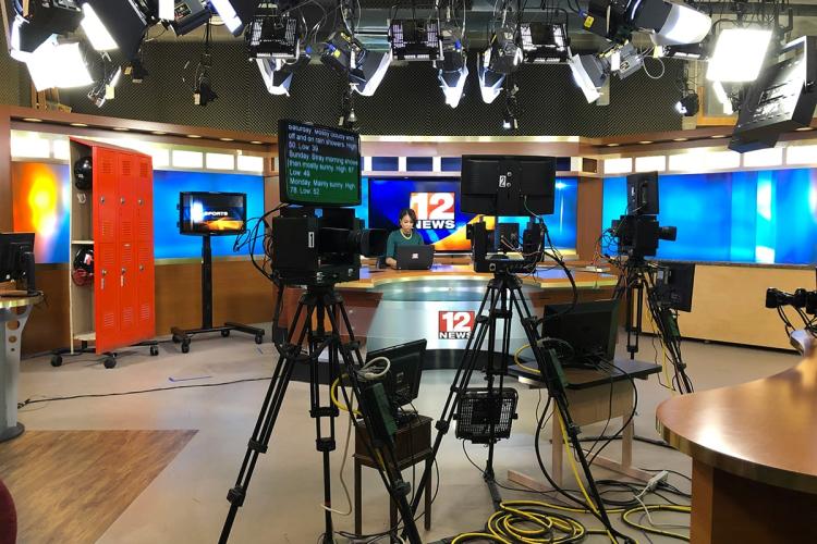 A view of an American news studio from behind the cameras