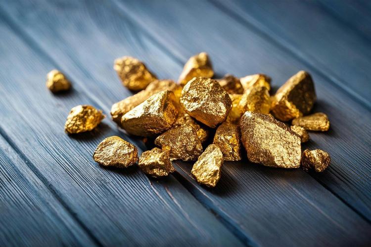 A pile of gold nuggets sitting on top of a table
